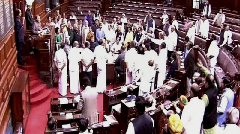 Members protest in the Rajya Sabha during the winter session of Parliament in New Delhi. (Photo: PTI) Members protest in the Rajya Sabha during the winter session of Parliament in New Delhi. (Photo: PTI)