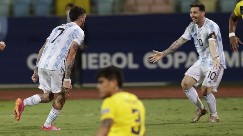 Argentinas Rodrigo De Paul (left) celebrates scoring the opening goal against Ecuador with Lionel Messi during the Copa America quarterfinal match in Goiania, Brazil, on Saturday. (Photo: AP)