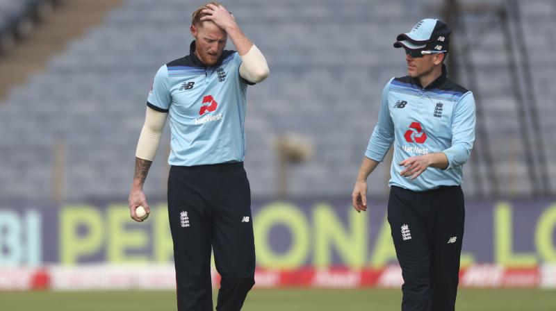 Ben Stokes (left) will take over the England captaincy from Eoin Mogan (right) in his absence. (Photo: AP)