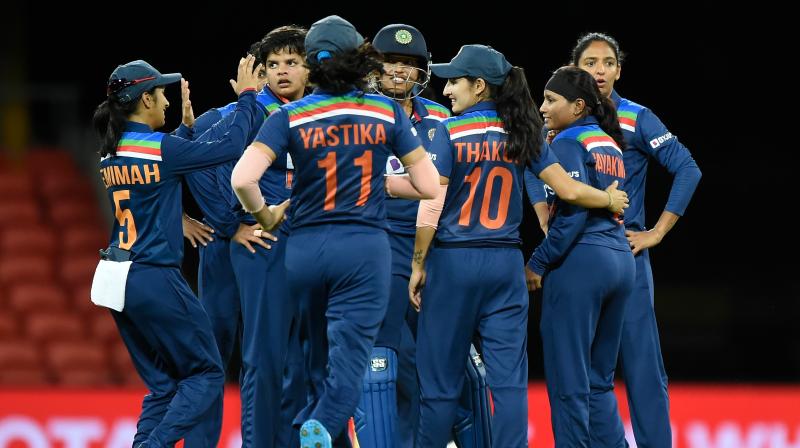 The Indian cricket team celebrate a wicket during their T20 match against Australia in Gold Coast on Saturd