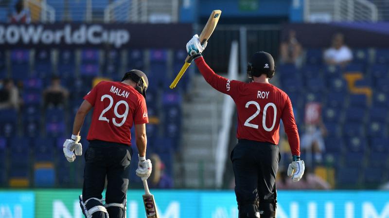 England's Jason Roy (R) celebrates after scoring a half-century (50 runs) as teammate England's Dawid Malan watches during the ICC men’s Twenty20 World Cup cricket match between England and Bangladesh at the Sheikh Zayed Cricket Stadium in Abu Dhabi on Wednesday. (Photo: AFP) England's Jason Roy (R) celebrates after scoring a half-century (50 runs) as teammate England's Dawid Malan watches during the ICC men’s Twenty20 World Cup cricket match between England and Bangladesh at the Sheikh Zayed Cricket Stadium in Abu Dhabi on Wednesday. (Photo: AFP)