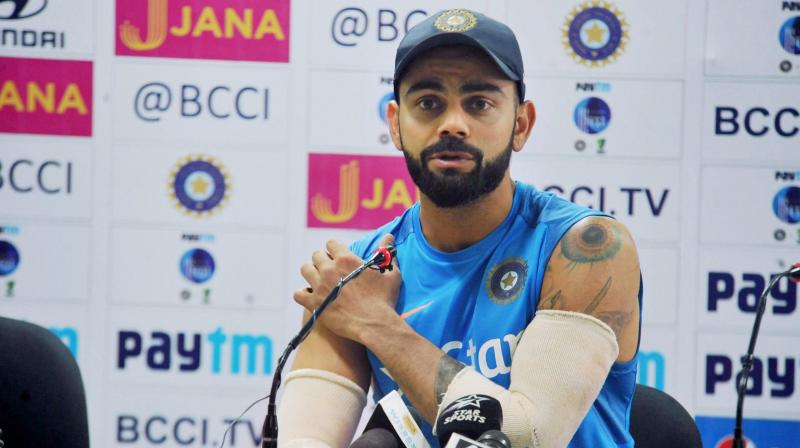 Virat Kohli sustained the right shoulder injury while putting in a dive on the first day of the drawn third Test in Ranchi. (Photo: PTI) Virat Kohli sustained the right shoulder injury while putting in a dive on the first day of the drawn third Test in Ranchi. (Photo: PTI)
