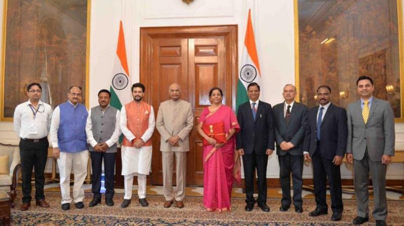 Finance Minister Nirmala Sitharaman with her team before presenting the budget. (Photo: Twitter | ANI) Finance Minister Nirmala Sitharaman with her team before presenting the budget. (Photo: Twitter | ANI)