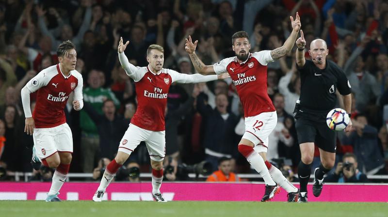 The victory ensured Arsene Wenger's side opened the English Premier League with a victory for only the second time in eight seasons. The victory ensured Arsene Wenger's side opened the English Premier League with a victory for only the second time in eight seasons.