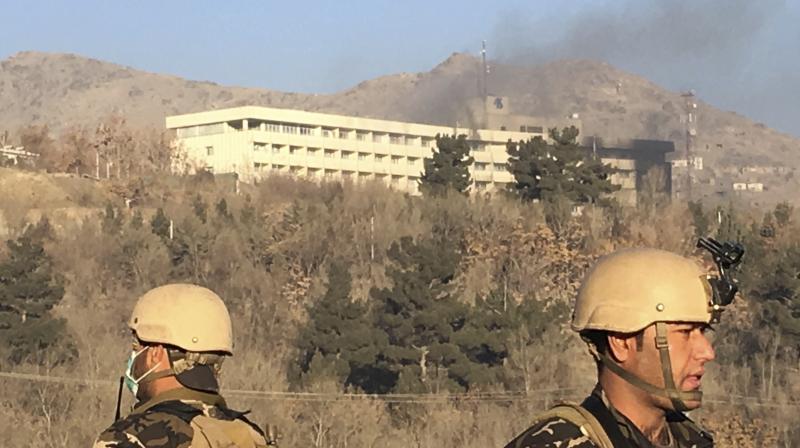 Smokes rises from the Intercontinental Hotel after an attack in Kabul, Afghanistan. (Photo: AP) Smokes rises from the Intercontinental Hotel after an attack in Kabul, Afghanistan. (Photo: AP)