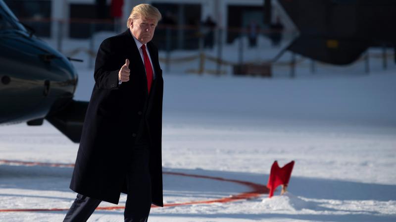 US President Donald Trump arrives in Davos, Switzerland. AFP