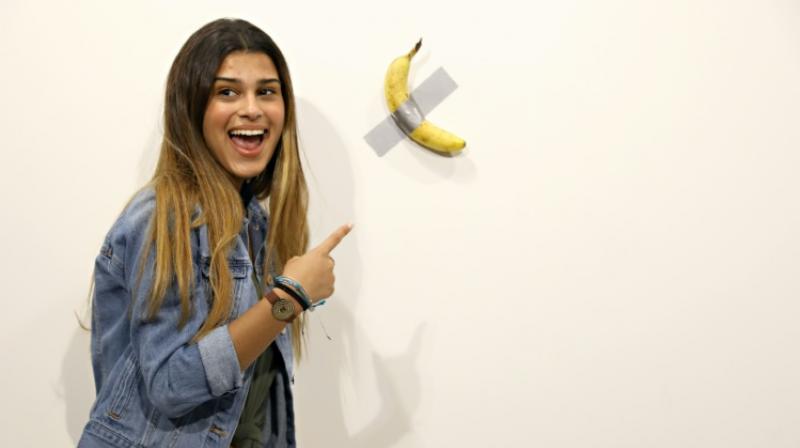 He did not destroy the art work. The banana is the idea. (Photo: AFP)