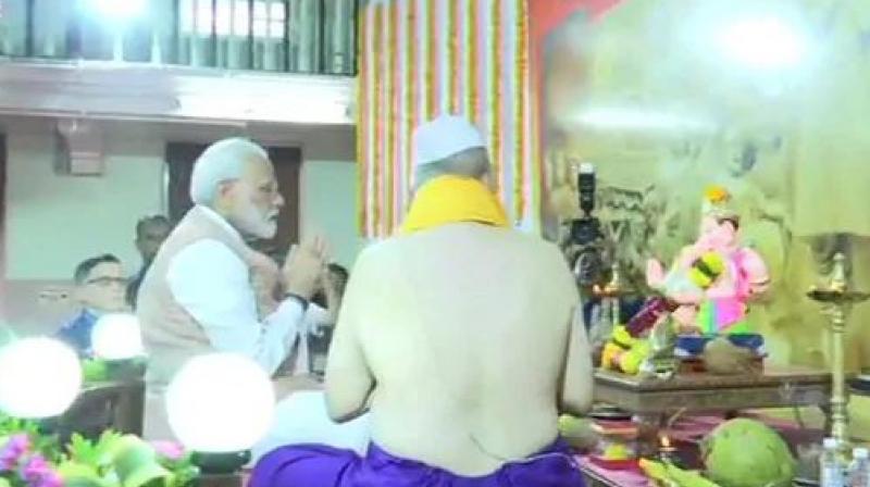 Modi was accompanied by Maharashtra Governor BS Koshyari and Chief Minister Devendra Fadnavis and others. (Photo: ANI | Twitter) Modi was accompanied by Maharashtra Governor BS Koshyari and Chief Minister Devendra Fadnavis and others. (Photo: ANI | Twitter)