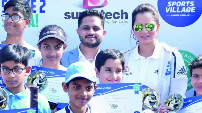 Sania Mirza (right) at a promotional event in Greater Noida on Sunday. Sania Mirza (right) at a promotional event in Greater Noida on Sunday.