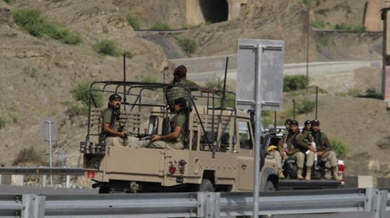 Pakistan army troops patrol near the Torkham border post between Pakistan and Afghanistan. (Photo: AP) Pakistan army troops patrol near the Torkham border post between Pakistan and Afghanistan. (Photo: AP)