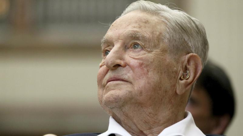 In this June 21, 2019, file photo, George Soros, Founder and Chairman of the Open Society Foundations, looks before the Joseph A. Schumpeter award ceremony in Vienna, Austria. Soros, the billionaire investor and philanthropist who has long been a target of conspiracy theories, is now being falsely accused of orchestrating and funding the protests over police killings of black people that have roiled the United States. (Photo | AP) In this June 21, 2019, file photo, George Soros, Founder and Chairman of the Open Society Foundations, looks before the Joseph A. Schumpeter award ceremony in Vienna, Austria. Soros, the billionaire investor and philanthropist who has long been a target of conspiracy theories, is now being falsely accused of orchestrating and funding the protests over police killings of black people that have roiled the United States. (Photo | AP)
