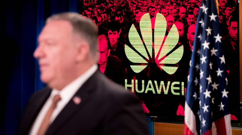 The US has led a worldwide campaign to convince foreign governments, particularly those in allied nations, to bar Huawei from their advanced telecommunications networks, arguing that allowing them into those systems would lead to violations of their citizens privacy. A monitor displays the logo for  Huawei  behind Secretary of State Mike Pompeo as he speaks during a news conference at the State Department in Washington,DC on July 15, 2020. (Photo | AFP)