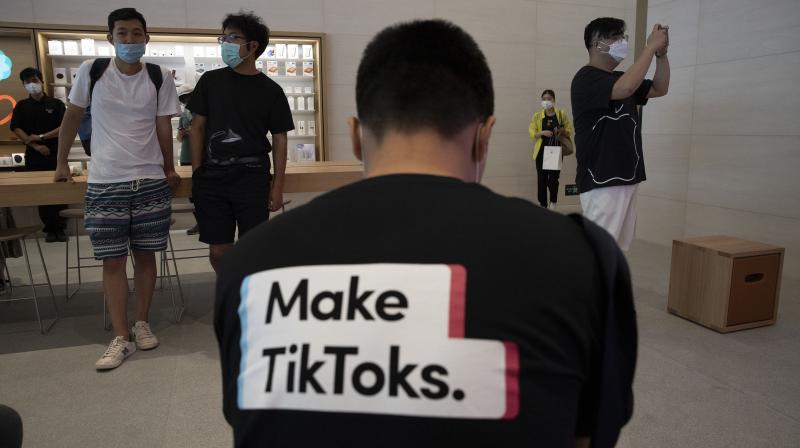 With TikTok, Microsoft will be making its first foray into social media, a sphere that has grown as people seek to connect amid the restrictions imposed by the pandemic on physical interactions. (Photo | AP) With TikTok, Microsoft will be making its first foray into social media, a sphere that has grown as people seek to connect amid the restrictions imposed by the pandemic on physical interactions. (Photo | AP)