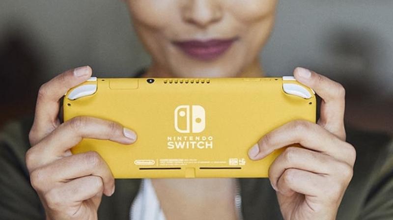 Nintendo Switch sales, both of the handheld machines and software games, were zooming amid the pandemic. The various online games in its lineup, including those for mobile devices, were also drawing more people. (Photo of Nintendo Switch Lite | Nintendo.com)