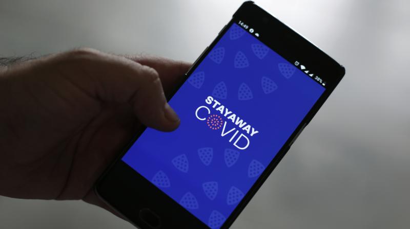 Health officials initially targeted a 60% adoption rate for tracing apps, an optimistic goal based on an Oxford University study from April although researchers noted a lower uptake still helps if other measures, such as social distancing, are enforced. (Photo | AP) Health officials initially targeted a 60% adoption rate for tracing apps, an optimistic goal based on an Oxford University study from April although researchers noted a lower uptake still helps if other measures, such as social distancing, are enforced. (Photo | AP)