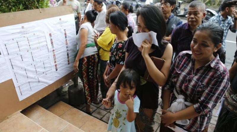 More than 10,000 people have volunteered to crowd-source election results posted at polling stations in a real-time bid to thwart attempts at fraud. (Photo: AP) More than 10,000 people have volunteered to crowd-source election results posted at polling stations in a real-time bid to thwart attempts at fraud. (Photo: AP)