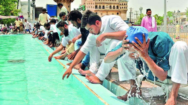 File photo of Muslims getting ready for Friday prayers at the Macca Masjin in Old City. (Photo: P. Surendra)