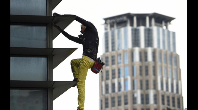 Alain Robert, dubbed the 'French Spider-Man', has scaled more than 100 structures without ropes or other safety equipment. (Photo: AFP) Alain Robert, dubbed the 'French Spider-Man', has scaled more than 100 structures without ropes or other safety equipment. (Photo: AFP)