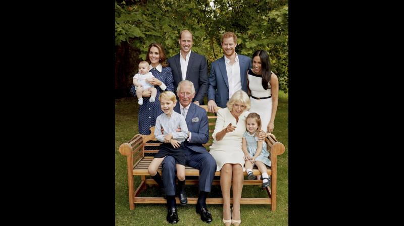 In this handout image provided by Clarence House and taken on Sept. 5, 2018, Britain's Prince Charles poses for an official portrait to mark his 70th Birthday in the gardens of Clarence House, with Camilla, Duchess of Cornwall, Prince William, Kate, Duchess of Cambridge, Prince George, Princess Charlotte, Prince Louis, Prince Harry and Meghan, Duchess of Sussex, in London, England. (Photo: Twitter/Kensington Palace) In this handout image provided by Clarence House and taken on Sept. 5, 2018, Britain's Prince Charles poses for an official portrait to mark his 70th Birthday in the gardens of Clarence House, with Camilla, Duchess of Cornwall, Prince William, Kate, Duchess of Cambridge, Prince George, Princess Charlotte, Prince Louis, Prince Harry and Meghan, Duchess of Sussex, in London, England. (Photo: Twitter/Kensington Palace)