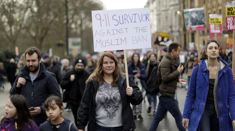 A woman takes part in a protest march, against US President Donald Trump's ban on travellers and immigrants from seven predominantly Muslim countries entering the US. (Photo: AP/File) A woman takes part in a protest march, against US President Donald Trump's ban on travellers and immigrants from seven predominantly Muslim countries entering the US. (Photo: AP/File)