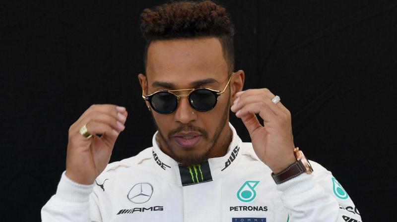 Speaking ahead of this weekend's Bahrain Grand Prix, the five-time Formula One world champion, who is the only black driver in the sport, made clear that families and people from all walks of life can make a stand against racism. (Photo: AFP / File) Speaking ahead of this weekend's Bahrain Grand Prix, the five-time Formula One world champion, who is the only black driver in the sport, made clear that families and people from all walks of life can make a stand against racism. (Photo: AFP / File)