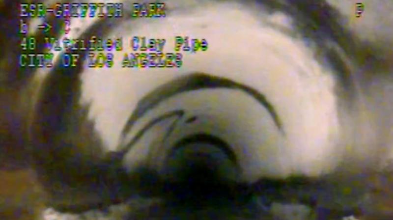 This photo from remote camera video provided by the Los Angeles Department of Sanitation shows where 13-year-old Jesse Hernandez traced an arc with his fingers, the small arc at center left, as he was swept through a 4-foot diameter pipe after falling into a hole in Griffith Park in Los Angeles, Monday, April 2, 2018. Hernandez spent more than 12 hours in the toxic environment of the sewer system before being rescued. (Photo: AP) This photo from remote camera video provided by the Los Angeles Department of Sanitation shows where 13-year-old Jesse Hernandez traced an arc with his fingers, the small arc at center left, as he was swept through a 4-foot diameter pipe after falling into a hole in Griffith Park in Los Angeles, Monday, April 2, 2018. Hernandez spent more than 12 hours in the toxic environment of the sewer system before being rescued. (Photo: AP)