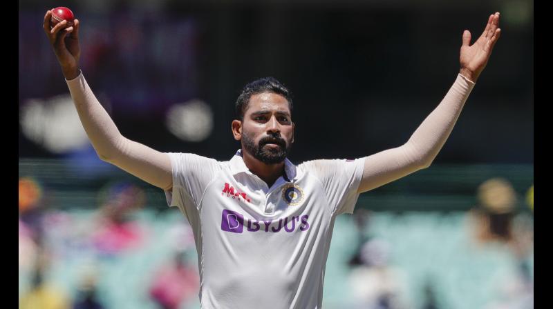 India’s Mohammed Siraj gestures in frustration during play on Day Four of the third Test match against Australia at the Sydney Cricket Ground on Sunday. -- AP India’s Mohammed Siraj gestures in frustration during play on Day Four of the third Test match against Australia at the Sydney Cricket Ground on Sunday. -- AP
