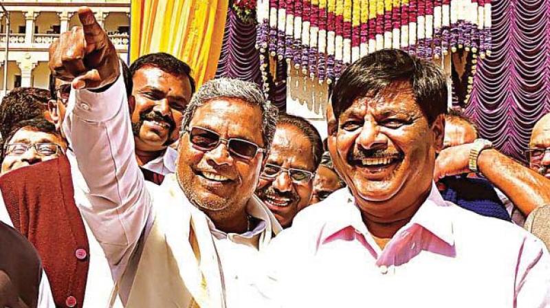 A file picture of former minister H.C. Mahadevappa with former chief minister Siddaramaiah. A file picture of former minister H.C. Mahadevappa with former chief minister Siddaramaiah.