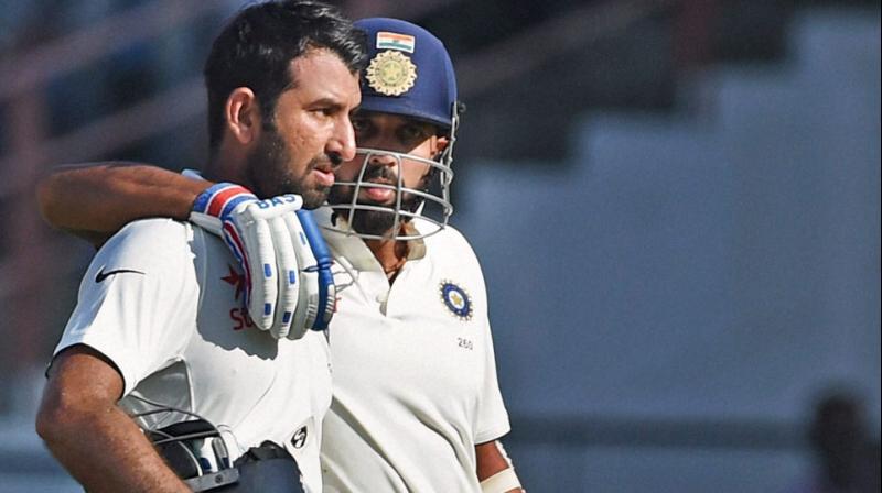 Hundreds from Cheteshwar Pujara and Murali Vijay have made sure that India stay in hunt in the first Test against England in Rajkot. (Photo: PTI) Hundreds from Cheteshwar Pujara and Murali Vijay have made sure that India stay in hunt in the first Test against England in Rajkot. (Photo: PTI)
