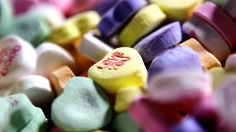The popular heart-shaped candies with love messages have become symbolic of Valentine's Day over the years. (Photo: AP) The popular heart-shaped candies with love messages have become symbolic of Valentine's Day over the years. (Photo: AP)