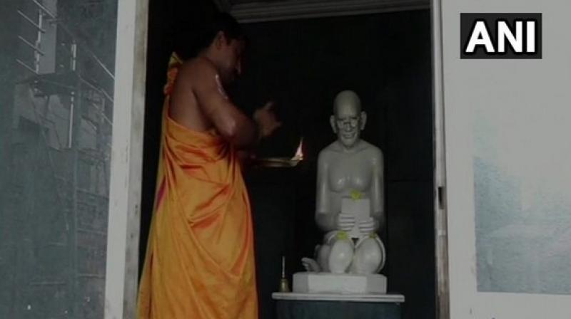 Prayers, along with tea, coffee and bananas, are rendred to Gandhi's idol by the temple priest at Shri Bramha Baidarkala Kshetra, three times a day. (Photo: ANI) Prayers, along with tea, coffee and bananas, are rendred to Gandhi's idol by the temple priest at Shri Bramha Baidarkala Kshetra, three times a day. (Photo: ANI)
