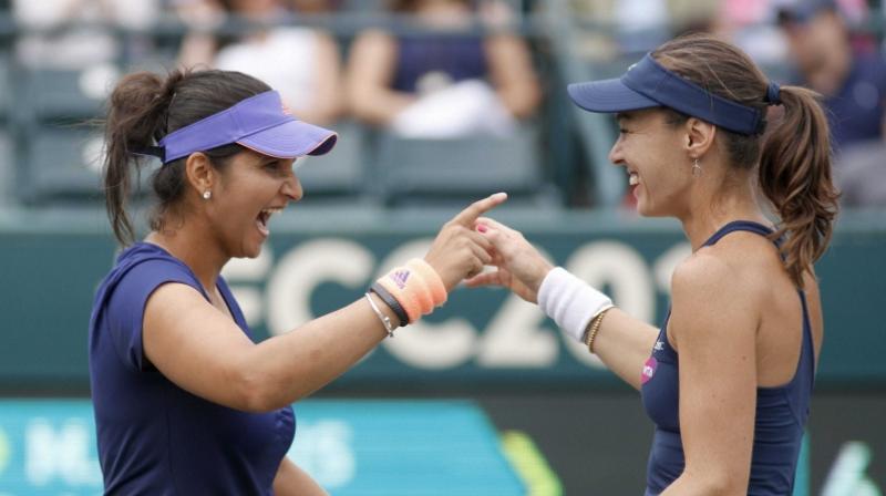 Sania had split with women's doubles partner Hingis but they paired up recently. (Photo: PTI) Sania had split with women's doubles partner Hingis but they paired up recently. (Photo: PTI)