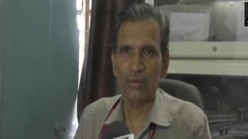 A peon posted at a government school in Katni was suspended on Friday after a video of him mercilessly thrashing students inside the classroom in presence of a teacher went viral over social media. (Photo: ANI) A peon posted at a government school in Katni was suspended on Friday after a video of him mercilessly thrashing students inside the classroom in presence of a teacher went viral over social media. (Photo: ANI)