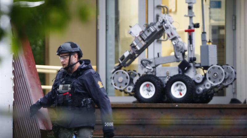 A gunman armed with multiple weapons opened fire in a mosque near the Norwegian capital Oslo on Saturday, injuring one person before being overpowered by an elderly worshipper, police and witnesses said. (Photo: AFP) A gunman armed with multiple weapons opened fire in a mosque near the Norwegian capital Oslo on Saturday, injuring one person before being overpowered by an elderly worshipper, police and witnesses said. (Photo: AFP)