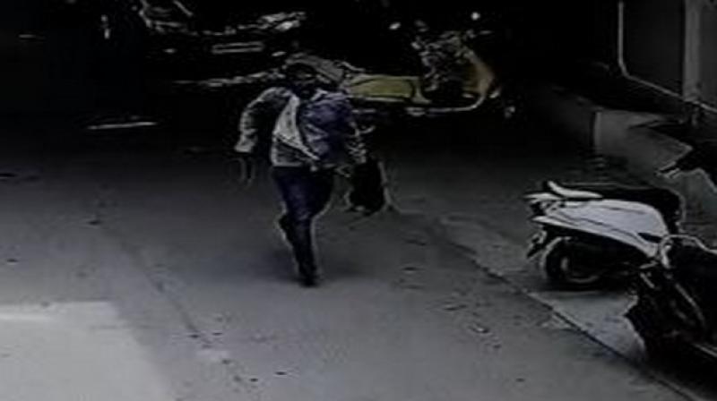 The whole incident was caught on CCTV camera, where the accused could be seen running with a sickle in one hand and the severed head in other. (Photo: ANI) The whole incident was caught on CCTV camera, where the accused could be seen running with a sickle in one hand and the severed head in other. (Photo: ANI)