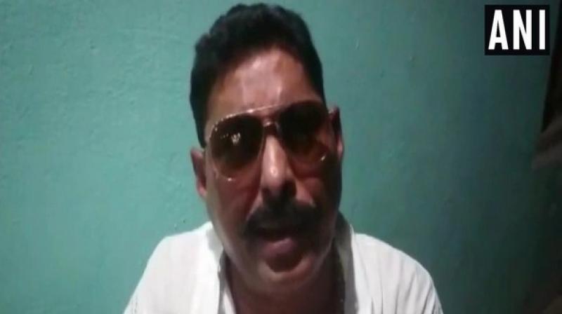 Independent MLA Anant Kumar Singh, who is facing heat after recovery of prohibited weapons from his residence has denied being afraid of arrest stating that he would be surrendering in next few days. (Photo: ANI) Independent MLA Anant Kumar Singh, who is facing heat after recovery of prohibited weapons from his residence has denied being afraid of arrest stating that he would be surrendering in next few days. (Photo: ANI)