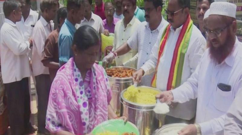 elugu Desam Party (TDP) MLA from Visakhapatnam South and ex-Army soldier Vasupalli Ganesh Kumar has been serving meals to poor people at Rs 5 by investing his own money at King George Hospital (KGH) Anna Canteen, after Ann Canteens were closed by the YSRCP government. (Photo: ANI) elugu Desam Party (TDP) MLA from Visakhapatnam South and ex-Army soldier Vasupalli Ganesh Kumar has been serving meals to poor people at Rs 5 by investing his own money at King George Hospital (KGH) Anna Canteen, after Ann Canteens were closed by the YSRCP government. (Photo: ANI)