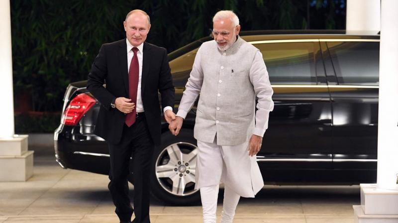 PM Modi and Russian president Vladimir Putin are expected to review bilateral defence cooperation in the wake of the US sanctions against Russian defence majors. (Photo: Twitter | @narendramodi) PM Modi and Russian president Vladimir Putin are expected to review bilateral defence cooperation in the wake of the US sanctions against Russian defence majors. (Photo: Twitter | @narendramodi)