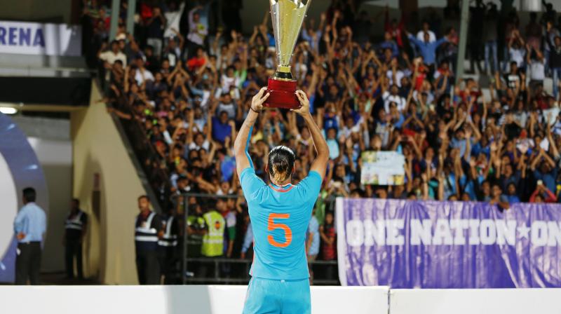 Sandesh Jhingan exults with the Tri-Nation Cup, after India drew 1-1 with St Kitts, to clinch the trophy. (Photo: AIFF Media) Sandesh Jhingan exults with the Tri-Nation Cup, after India drew 1-1 with St Kitts, to clinch the trophy. (Photo: AIFF Media)