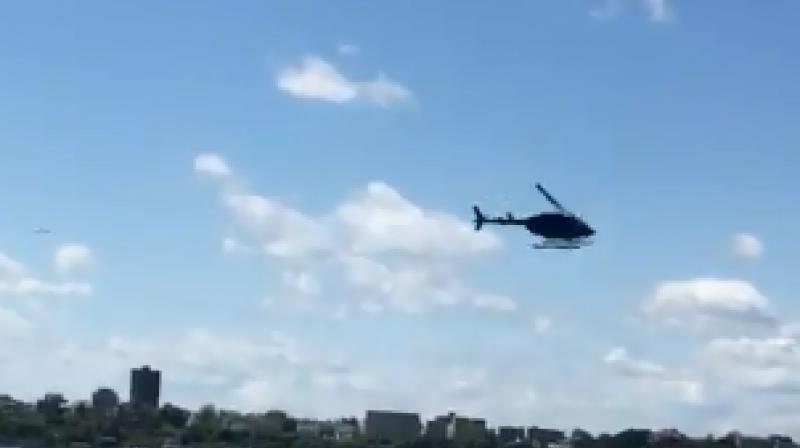 Dramatic video footage of the incident shot by witnesses and posted on social media showed the helicopter spinning seemingly out of control over the Hudson near 30th Street, before plummeting into the water. (Photo: Screengrab) Dramatic video footage of the incident shot by witnesses and posted on social media showed the helicopter spinning seemingly out of control over the Hudson near 30th Street, before plummeting into the water. (Photo: Screengrab)