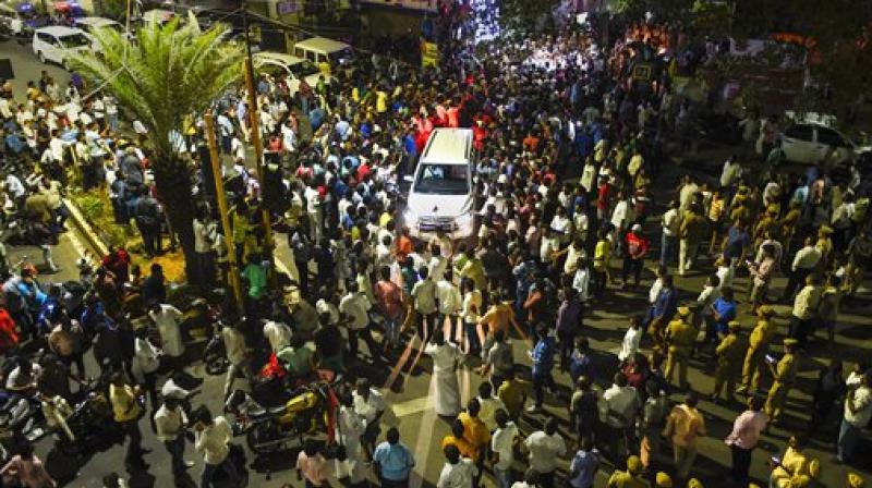 DMK supporters wait outside hospital where Karunanidhi is admitted. (Photo: PTI) DMK supporters wait outside hospital where Karunanidhi is admitted. (Photo: PTI)