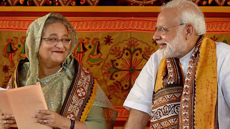 Her remarks come a week after she met Modi in New York and said that the NRC has become a matter of ‘great concern’ for Bangladeshis. (Photo: PTI) Her remarks come a week after she met Modi in New York and said that the NRC has become a matter of ‘great concern’ for Bangladeshis. (Photo: PTI)