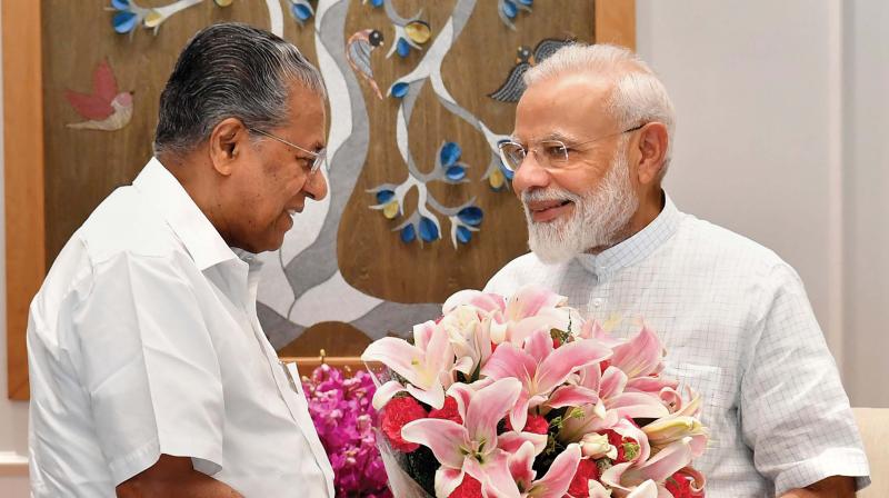Chief Minister Pinarayi Vijayan calls on Prime Minister Narendra Modi at the prime minister's office in New Delhi on Saturday (Photo: AP) Chief Minister Pinarayi Vijayan calls on Prime Minister Narendra Modi at the prime minister's office in New Delhi on Saturday (Photo: AP)