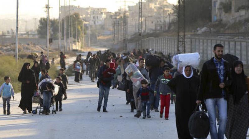 The Britain-based monitor said more than 20,000 people had fled to western neighbourhoods of the city held by the government, with another 30,000 moving to areas held by Kurdish forces. (Photo: AP) The Britain-based monitor said more than 20,000 people had fled to western neighbourhoods of the city held by the government, with another 30,000 moving to areas held by Kurdish forces. (Photo: AP)