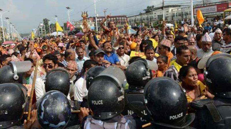 The protests affected normal life in Butwal area of Rupandehi district where people holding banners and shouting slogans took to the streets to register their discontent. (Photo: Representational Image/AFP) The protests affected normal life in Butwal area of Rupandehi district where people holding banners and shouting slogans took to the streets to register their discontent. (Photo: Representational Image/AFP)