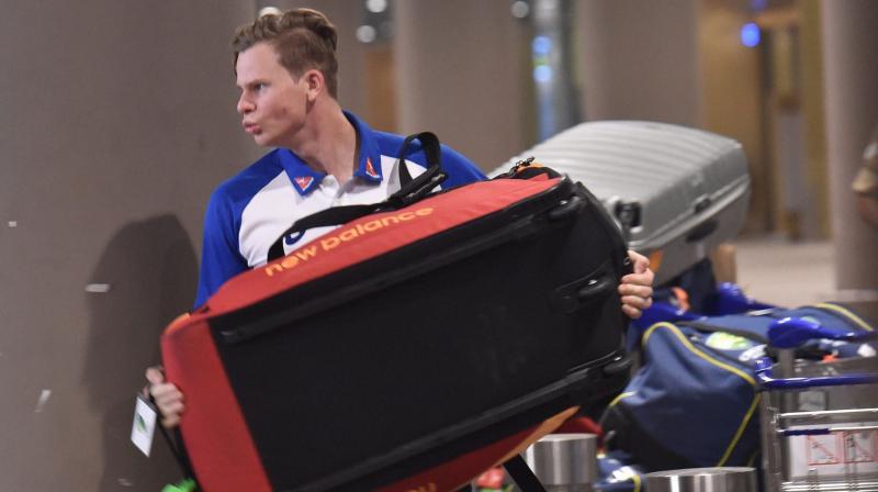 Steve Smith was seen hauling a kit-bag upon arrival at the Mumbai airport. (Photo: PTI) Steve Smith was seen hauling a kit-bag upon arrival at the Mumbai airport. (Photo: PTI)