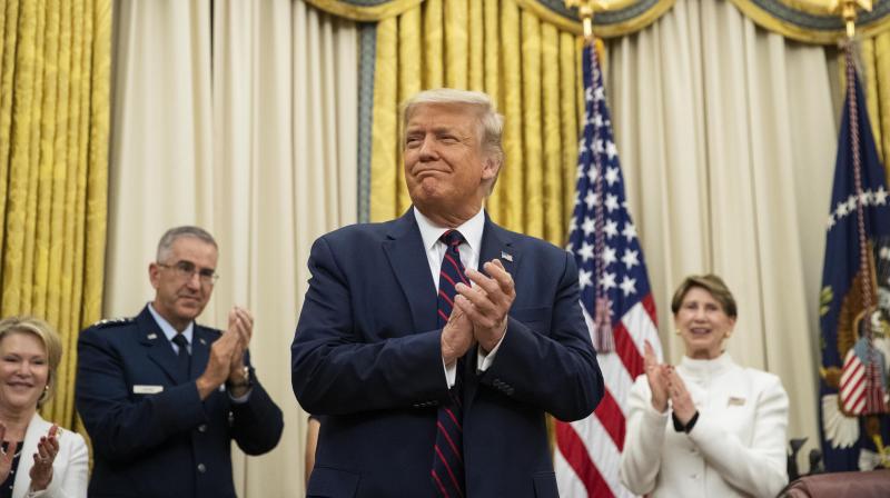 President Donald Trump (centre). (AP)