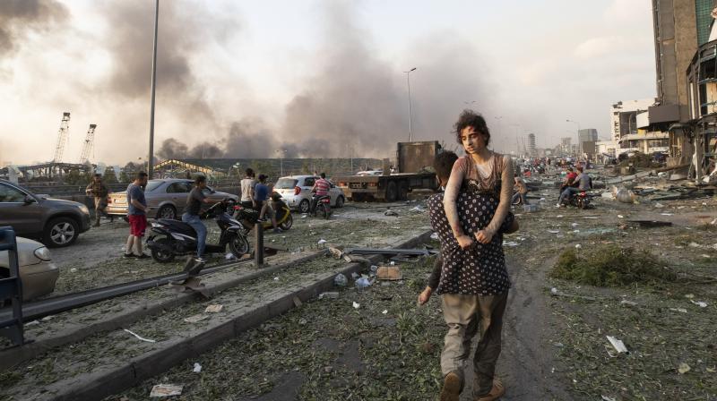 People evacuate the wounded after a massive explosion in Beirut, Lebanon, Tuesday, Aug. 4, 2020. (AP) People evacuate the wounded after a massive explosion in Beirut, Lebanon, Tuesday, Aug. 4, 2020. (AP)