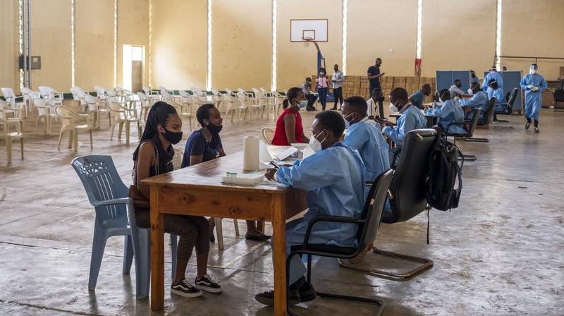 Nurses collect the data of people about to get tested for COVID-19 at a testing center in the capital Kigali, Rwanda. (AP) Nurses collect the data of people about to get tested for COVID-19 at a testing center in the capital Kigali, Rwanda. (AP)