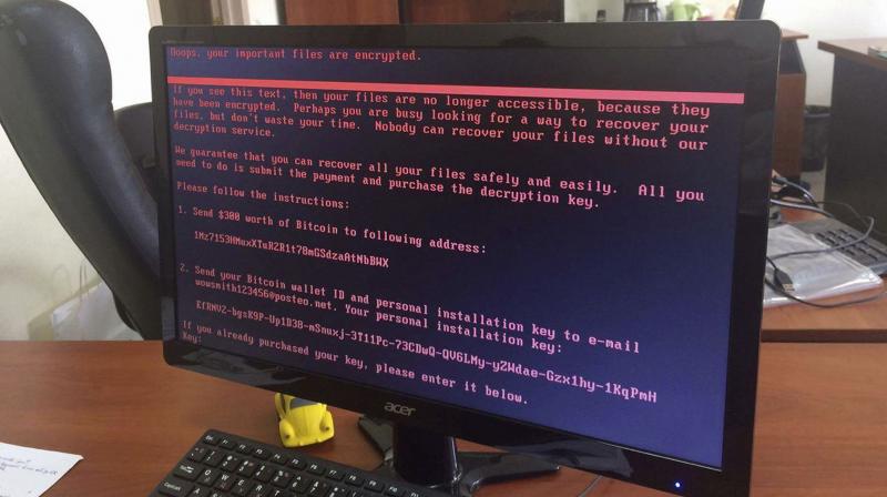 A computer screen cyberattack warning notice reportedly holding computer files to ransom, as part of a massive international cyberattack, at an office in Kiev, Ukraine. (Photo: AP) A computer screen cyberattack warning notice reportedly holding computer files to ransom, as part of a massive international cyberattack, at an office in Kiev, Ukraine. (Photo: AP)